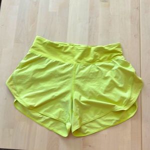 Lime green Lululemon running shorts. Size 8